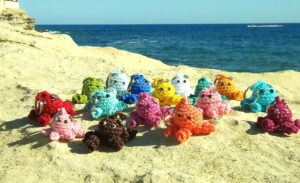 Baby octopus crowd - crocheted